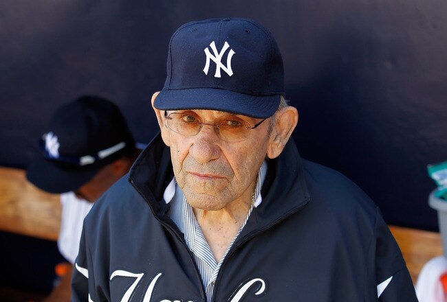 TAMPA, FL - FEBRUARY 26:  Hall of Famer Yogi Berra of the New York Yankees stands in the dugout just prior to the start of the Grapefruit League Spring Training Game against the Philadelphia Phillies at George M. Steinbrenner Field on February 26, 2011 in Tampa, Florida.  (Photo by J. Meric/Getty Images)