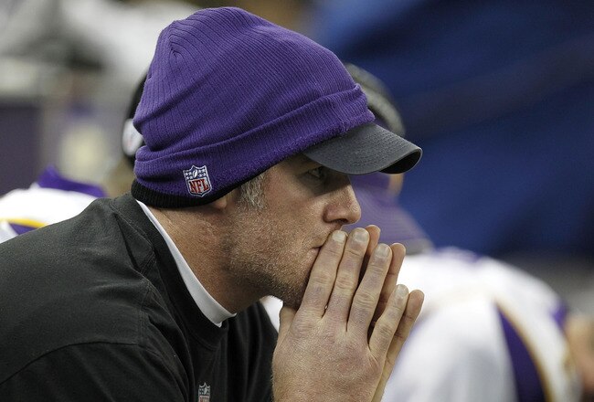DETROIT, MI - JANUARY 02:  Brett Favre #4 of the Minnesota Vikings looks on from the bench while playing the Detroit Lions at Ford Field on January 2, 2011 in Detroit, Michigan.  (Photo by Gregory Shamus/Getty Images)