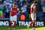 BOLTON, ENGLAND - APRIL 24:  Cesc Fabregas of Arsenal looks dejected at the end of the Barclays Premier League match between Bolton Wanderers and Arsenal at the Reebok Stadium on April 24, 2011 in Bolton, England.  (Photo by Clive Brunskill/Getty Images)