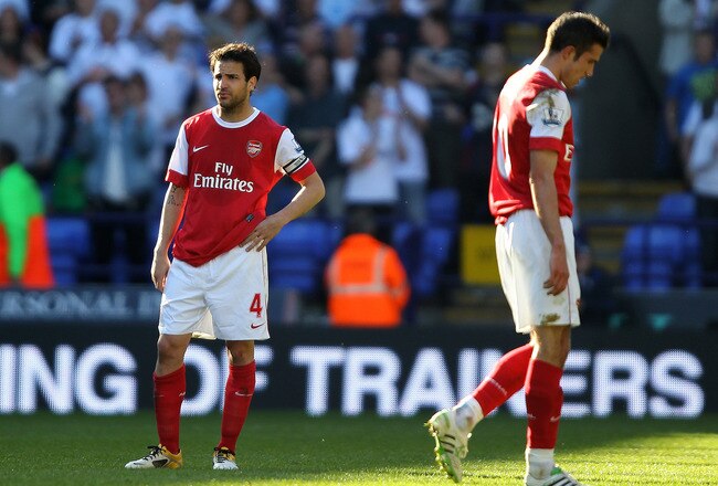 BOLTON, ENGLAND - APRIL 24:  Cesc Fabregas of Arsenal looks dejected at the end of the Barclays Premier League match between Bolton Wanderers and Arsenal at the Reebok Stadium on April 24, 2011 in Bolton, England.  (Photo by Clive Brunskill/Getty Images)