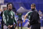 INDIANAPOLIS, IN - FEBRUARY 28: Former North Carolina teammates Marvin Austin (L) and Bruce Carter look on during the 2011 NFL Scouting Combine at Lucas Oil Stadium on February 28, 2011 in Indianapolis, Indiana. (Photo by Joe Robbins/Getty Images)