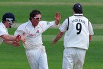 BIRMINGHAM, ENGLAND - MAY 06: Lancashire bowler Simon Kerrigan (c) celebrates with James Anderson (r) after he had dismissed Warwickshire batsman Mohammad Yousuf during day three of the Division One LV County Championship match between Warwickshire and Lancashire at Edgbaston on May 6, 2011 in Birmingham, England.  (Photo by Stu Forster/Getty Images)