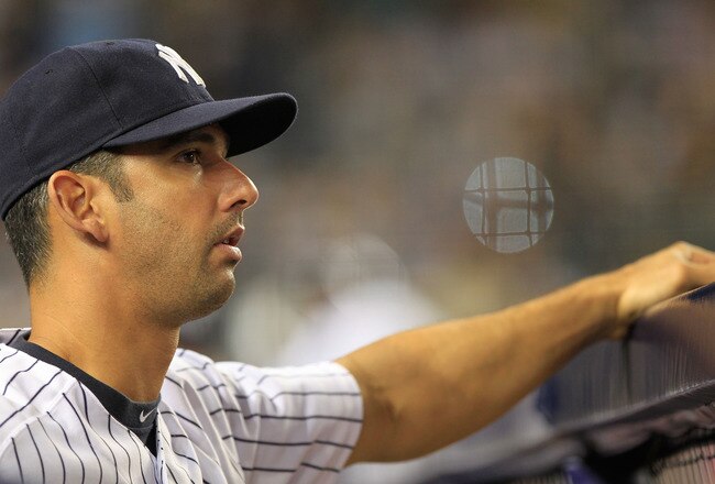 NEW YORK, NY - APRIL 26:  Jorge Posada #20 of the New York Yankees looks on from the dugout against the Chicago White Sox at Yankee Stadium on April 26, 2011 in the Bronx borough of New York City.  (Photo by Chris Trotman/Getty Images)
