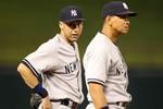 ARLINGTON, TX - MAY 07:  Derek Jeter #2 and Alex Rodriguez #13 of the New York Yankees talk between innings at Rangers Ballpark in Arlington on May 7, 2011 in Arlington, Texas.  (Photo by Ronald Martinez/Getty Images)