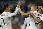 MADRID, SPAIN - MAY 10:  Karim Benzema (R) of Real Madrid celebrates with Cristiano Ronaldo after scoring his side third goal during the La Liga match between Real Madrid and Getafe at Estadio Santiago Bernabeu on May 10, 2011 in Madrid, Spain.  (Photo by Angel Martinez/Getty Images)