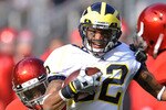 COLUMBUS, OH - NOVEMBER 27:  Darryl Stonum #22 of the Michigan Wolverines runs with the ball against the Ohio State Buckeyes at Ohio Stadium on November 27, 2010 in Columbus, Ohio.  (Photo by Jamie Sabau/Getty Images)