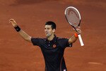 MADRID, SPAIN - MAY 08:  Novak Djokovic of Serbia celebrates at match point after defeating Rafael Nadal of Spain in the final during day nine of the Mutua Madrilena Madrid Open Tennis on May 8, 2011 in Madrid, Spain.  (Photo by Julian Finney/Getty Images)