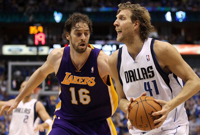 DALLAS, TX - MAY 08:  Forward Dirk Nowitzki #41 of the Dallas Mavericks dribbles the ball against Pau Gasol #16 of the Los Angeles Lakers in Game Four of the Western Conference Semifinals during the 2011 NBA Playoffs on May 8, 2011 at American Airlines Center in Dallas, Texas.  NOTE TO USER: User expressly acknowledges and agrees that, by downloading and or using this photograph, User is consenting to the terms and conditions of the Getty Images License Agreement.  (Photo by Ronald Martinez/Getty Images)