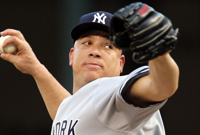 ARLINGTON, TX - MAY 07:  Pitcher Bartolo Colon #40 of the New York Yankees throws against the Texas Rangers in the first inning at Rangers Ballpark in Arlington on May 7, 2011 in Arlington, Texas.  (Photo by Ronald Martinez/Getty Images)