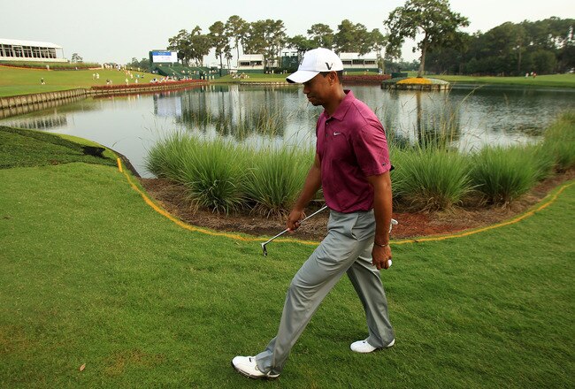 PONTE VEDRA BEACH, FL - MAY 11:  Tiger Woods walks to a tee during a practice round prior to the start of THE PLAYERS Championship held at THE PLAYERS Stadium course at TPC Sawgrass on May 11, 2011 in Ponte Vedra Beach, Florida.  (Photo by Streeter Lecka/Getty Images)