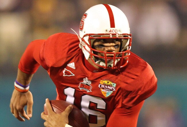 ORLANDO, FL - DECEMBER 28:  Russell Wilson #16 of the North Carolina State Wolfpack rushes with the ball during the Champs Sports Bowl against the West Virginia Mountineers at Florida Citrus Bowl Stadium on December 28, 2010 in Orlando, Florida.  (Photo by Mike Ehrmann/Getty Images)