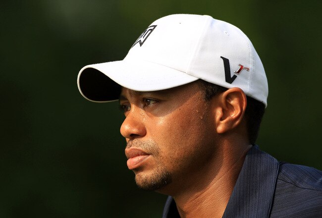 PONTE VEDRA BEACH, FL - MAY 12:  Tiger Woods looks on from the fifth hole during the first round of THE PLAYERS Championship held at THE PLAYERS Stadium course at TPC Sawgrass on May 12, 2011 in Ponte Vedra Beach, Florida.  (Photo by Streeter Lecka/Getty Images)