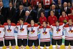 VANCOUVER, BC - FEBRUARY 28:  (L-R) Duncan Smith #2, Shea Weber #6, Brent Seabrook #7, Drew Doughty #8, Brenden Morrow #10, Patrick Marleau #11, Jarome Iginla #12 and Dany Heatley #15 of Canada stand together during the playing of the Canadian National Anthem after the ice hockey men's gold medal game between USA and Canada on day 17 of the Vancouver 2010 Winter Olympics at Canada Hockey Place on February 28, 2010 in Vancouver, Canada.  Canada defeated USA 3-2 in overtime.  (Photo by Jamie Squire/Getty Images)