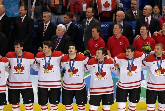 VANCOUVER, BC - FEBRUARY 28:  (L-R) Duncan Smith #2, Shea Weber #6, Brent Seabrook #7, Drew Doughty #8, Brenden Morrow #10, Patrick Marleau #11, Jarome Iginla #12 and Dany Heatley #15 of Canada stand together during the playing of the Canadian National Anthem after the ice hockey men's gold medal game between USA and Canada on day 17 of the Vancouver 2010 Winter Olympics at Canada Hockey Place on February 28, 2010 in Vancouver, Canada.  Canada defeated USA 3-2 in overtime.  (Photo by Jamie Squire/Getty Images)