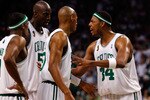 BOSTON - JUNE 17:  (L-R) Rajon Rondo #9, Kevin Garnett #5 and Ray Allen #20 listen to teammate Paul Pierce #34 of the Boston Celtics in the third quarter of Game Six of the 2008 NBA Finals against the Los Angeles Lakers on June 17, 2008 at TD Banknorth Garden in Boston, Massachusetts. NOTE TO USER: User expressly acknowledges and agrees that, by downloading and/or using this Photograph, user is consenting to the terms and conditions of the Getty Images License Agreement.  (Photo by Jim Rogash/Getty Images)