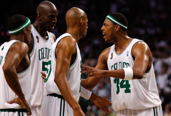 BOSTON - JUNE 17:  (L-R) Rajon Rondo #9, Kevin Garnett #5 and Ray Allen #20 listen to teammate Paul Pierce #34 of the Boston Celtics in the third quarter of Game Six of the 2008 NBA Finals against the Los Angeles Lakers on June 17, 2008 at TD Banknorth Garden in Boston, Massachusetts. NOTE TO USER: User expressly acknowledges and agrees that, by downloading and/or using this Photograph, user is consenting to the terms and conditions of the Getty Images License Agreement.  (Photo by Jim Rogash/Getty Images)
