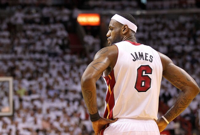 MIAMI, FL - MAY 11:  LeBron James #6 of the Miami Heat looks on during Game Five of the Eastern Conference Semifinals of the 2011 NBA Playoffs against the Boston Celtics at American Airlines Arena on May 11, 2011 in Miami, Florida. NOTE TO USER: User expressly acknowledges and agrees that, by downloading and/or using this Photograph, User is consenting to the terms and conditions of the Getty Images License Agreement.  (Photo by Mike Ehrmann/Getty Images)