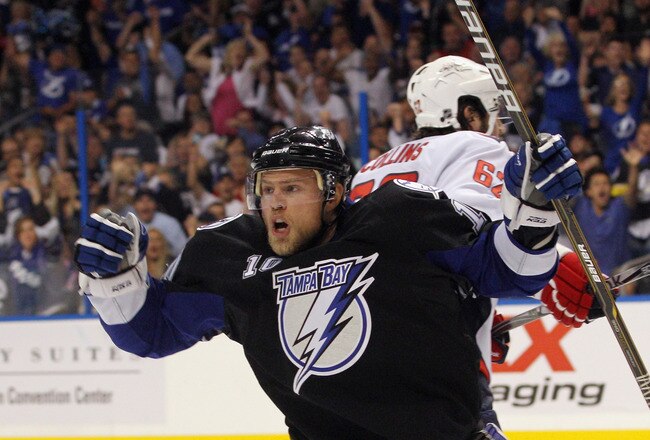 TAMPA, FL - MAY 04:  Sean Bergenheim #10 of the Tampa Bay Lightning scores at 4:41 of the second period against the Washington Capitals in Game Four of the Eastern Conference Semifinals during the 2011 NHL Stanley Cup Playoffs at the St Pete Times Forum on May 4, 2011 in Tampa, Florida. The Lightning defeated the Capitals 5-3 and swept the series four games to none.  (Photo by Bruce Bennett/Getty Images)