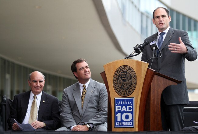 BOULDER, CO - JUNE 11: (R-L) PAC-10 Commissioner Larry Scott speaks as Colorado Athletic Director Mike Bohn and University of Colorado Chancellor Phil DiStefano listen during a press conference at Folsom Stadium on June 11, 2010 in Boulder, Colorado. The University of Colorado Board of Regents voted unanimously to accept an invitation to join the PAC-10 Conference.  (Photo by Marc Piscotty/Getty Images)