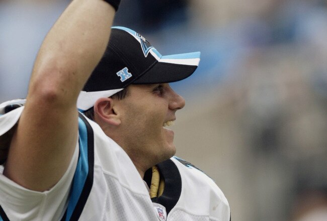 CHARLOTTE, NC - SEPTEMBER 7:  Jake Delhomme #17 of the Carolina Panthers celebrates a come-from-behind victory over the Jacksonville Jaguars on September 7, 2003 at Ericsson Stadium in Charlotte, North Carolina. The Panthers defeated the Jaguars 24-23. (Photo by Craig Jones/Getty Images)