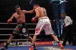 HERNING, DENMARK - APRIL 24: Carl Froch (L) of England lands a left hook on Mikkel Kessler of Denmark during their Super Six WBC Super Middleweight title fight on April 24, 2010 at MCH Messecenter Arena in Herning, Denmark. (Photo by John Gichigi/Getty Images)