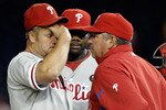 WASHINGTON, DC - APRIL 12:  Starting pitcher Joe Blanton #56 of the Philadelphia Phillies (L) talks with pitching coach Rich Dubee (R) during the fourth inning against the Washington Nationals at Nationals Park on April 12, 2011 in Washington, DC.  (Photo by Rob Carr/Getty Images)