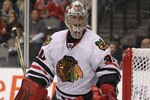 DALLAS, TX - FEBRUARY 11:  Goaltender Marty Turco #30 of the Chicago Blackhawks in goal against the Dallas Stas at American Airlines Center on February 11, 2011 in Dallas, Texas.  (Photo by Ronald Martinez/Getty Images)