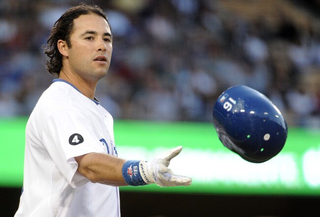 LOS ANGELES, CA - APRIL 30:  Andre Ethier #16 of the Los Angeles Dodgers tosses his helmet in reaction to his strikeout against the San Diego Padres during the first inning at Dodger Stadium on April 30, 2011 in Los Angeles, California.  (Photo by Harry How/Getty Images)