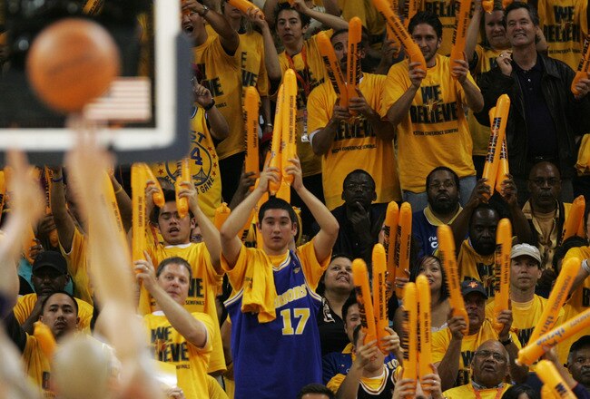 OAKLAND, CA - MAY 11:  Fans of the Golden State Warriors celebrate against the Utah Jazz in Game Three of the Western Conference Semifinals during the 2007 NBA Playoffs at Oracle Arena May 11, 2007 in Oakland, California. NOTE TO USER: User expressly acknowledges and agrees that, by downloading and or using this photograph, user is consenting to the terms and conditions of the Getty Images License Agreement.  (Photo by Justin Sullivan/Getty Images)