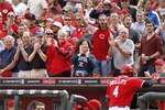 CINCINNATI, OH - MAY 14: Fans cheer as Brandon Phillips #4 of the Cincinnati Reds returns to the dugout after hitting a home run in the second inning against the St. Louis Cardinals at Great American Ball Park on May 14, 2011 in Cincinnati, Ohio. The Reds defeated the Cardinals 7-3. (Photo by Joe Robbins/Getty Images)