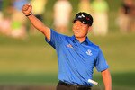 PONTE VEDRA BEACH, FL - MAY 15:  K.J. Choi of South Korea celebrates making a par-saving putt to defeat David Toms on the first playoff hole during the final round of THE PLAYERS Championship held at THE PLAYERS Stadium course at TPC Sawgrass on May 15, 2011 in Ponte Vedra Beach, Florida.  (Photo by Streeter Lecka/Getty Images)