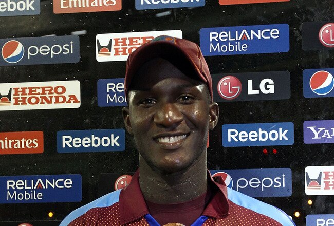 PROVIDENCE, GUYANA - APRIL 30:  Darren Sammy of West Indies poses with his man of the match award after the ICC T20 World Cup Group D match between West Indies and Ireland at the Guyana National Stadium Cricket Ground on April 30, 2010 in Providence, Guyana.  (Photo by Clive Rose/Getty Images)