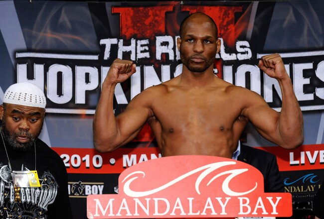 LAS VEGAS - APRIL 02:  Boxer Bernard Hopkins (R) poses on the scale as his trainer Nazim Richardson looks on during the official weigh-in for his bout against Roy Jones Jr. at the Mandalay Bay Events Center April 2, 2010 in Las Vegas, Nevada. The two will meet in a light heavyweight bout on April 3 in Las Vegas.  (Photo by Ethan Miller/Getty Images)