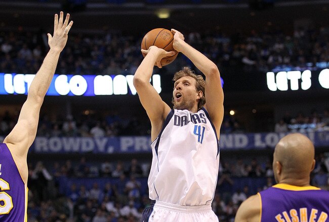 DALLAS, TX - MAY 08:  Forward Dirk Nowitzki #41 of the Dallas Mavericks takes a shot against Pau Gasol #16 of the Los Angeles Lakers in Game Four of the Western Conference Semifinals during the 2011 NBA Playoffs on May 8, 2011 at American Airlines Center in Dallas, Texas.  NOTE TO USER: User expressly acknowledges and agrees that, by downloading and or using this photograph, User is consenting to the terms and conditions of the Getty Images License Agreement.  (Photo by Ronald Martinez/Getty Images)