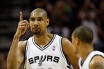 SAN ANTONIO, TX - APRIL 17:  Forward Tim Duncan #21 of the San Antonio Spurs reacts against the Memphis Grizzlies in Game One of the Western Conference Quarterfinals in the 2011 NBA Playoffs on April 17, 2011 at AT&T Center in San Antonio, Texas.  NOTE TO USER: User expressly acknowledges and agrees that, by downloading and or using this photograph, User is consenting to the terms and conditions of the Getty Images License Agreement.  (Photo by Ronald Martinez/Getty Images)