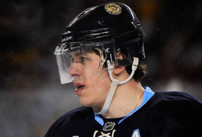 PITTSBURGH, PA - JANUARY 01:  Evgeni Malkin #71 of the Pittsburgh Penguins looks on during the third period of the game against the Washington Capitals at the 2011 NHL Bridgestone Winter Classic at Heinz Field on January 1, 2011 in Pittsburgh, Pennsylvania. Washington won 3-1.  (Photo by Jamie Sabau/Getty Images)