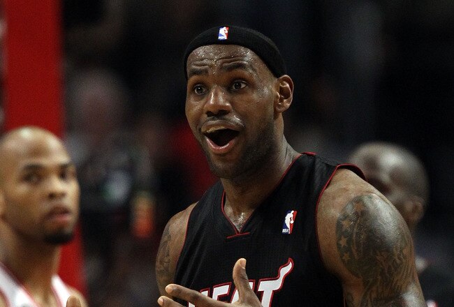 CHICAGO, IL - MAY 15:  LeBron James #6 of the Miami Heat reacts against the Chicago Bulls in the first half of Game One of the Eastern Conference Finals during the 2011 NBA Playoffs on May 15, 2011 at the United Center in Chicago, Illinois. NOTE TO USER: User expressly acknowledges and agrees that, by downloading and or using this photograph, User is consenting to the terms and conditions of the Getty Images License Agreement  (Photo by Jonathan Daniel/Getty Images)
