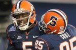 NEW YORK, NY - DECEMBER 30: Marcus Sales #5 of the Syracuse Orange is congratulated by team mate Jose Cruz #85 after scoring a touchdown against  the Kansas State Wildcats during the New Era Pinstripe Bowl at Yankee Stadium on December 30, 2010 in New York, New York.  (Photo by Chris McGrath/Getty Images)