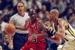 25 May, 1998:  Michael Jordan #23 of the Chicago Bulls dribbles as Reggie Miller #31 of the Indianapolis Pacers guards during the NBA Eastern Conference Finals at the Market Square Arena in Indianapolis, Indiana.  The Pacers defeated the Bulls 96-94. Mandatory Credit: Vincent Laforet  /Allsport