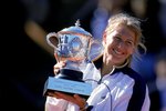 5 Jun 1999: Steffi Graf of Germany celebrates with the championship trophy after defeating Martina Hingis of Switzerland to win the women's singles final of the French Open Tennis at Roland Garros, Paris.