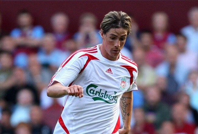 BIRMINGHAM, UNITED KINGDOM - AUGUST 11:  Liverpool striker Fernando Torres runs with the ball during the Barclays Premier League Match between Aston Villa and Liverpool at Villa Park on August 11, 2007 in Birmingham, England.  (Photo by Stu Forster/Getty Images)
