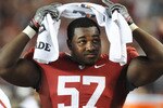 TUSCALOOSA, AL - NOVEMBER 13: Defensive lineman Marcell Dareus #57 of the Alabama Crimson Tide watches play against the Mississippi State Bulldogs November 13, 2010 at Bryant-Denny Stadium in Tuscaloosa, Alabama.  (Photo by Al Messerschmidt/Getty Images)