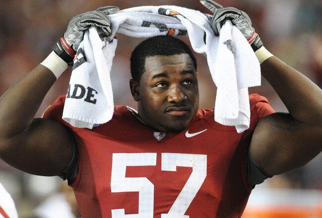 TUSCALOOSA, AL - NOVEMBER 13: Defensive lineman Marcell Dareus #57 of the Alabama Crimson Tide watches play against the Mississippi State Bulldogs November 13, 2010 at Bryant-Denny Stadium in Tuscaloosa, Alabama.  (Photo by Al Messerschmidt/Getty Images)