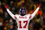 GREEN BAY, WI - JANUARY 20:  Wide receiver Plaxico Burress #17 of the New York Giants reacts to the crowd during the NFC championship game against the Green Bay Packers on January 20, 2008 at Lambeau Field in Green Bay, Wisconsin.  (Photo by Jamie Squire/Getty Images)