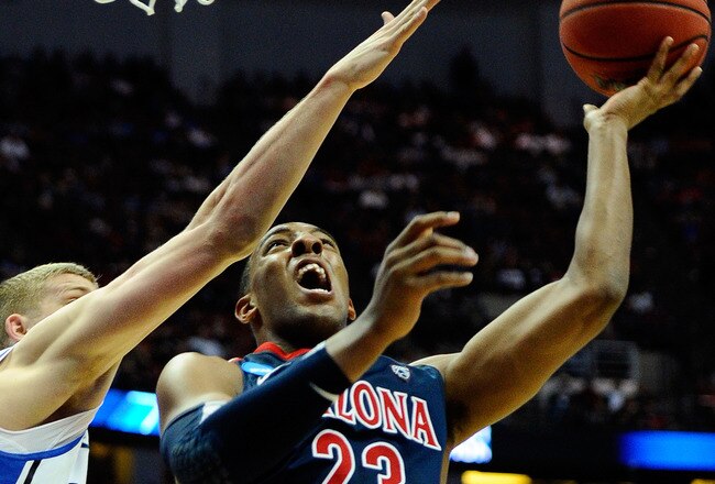 ANAHEIM, CA - MARCH 24:  Derrick Williams #23 of the Arizona Wildcats drives to the basket against Mason Plumlee #5 of the Duke Blue Devils during the west regional semifinal of the 2011 NCAA men's basketball tournament at the Honda Center on March 24, 2011 in Anaheim, California.  (Photo by Kevork Djansezian/Getty Images)
