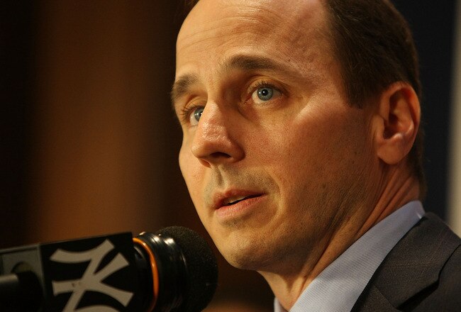 NEW YORK - DECEMBER 18:  General Manager of the New York Yankees, Brian Cashman, talks to the media during a press conference to announce the signing of CC Sabathia and A.J. Burnett at Yankee Stadium on December 18, 2008 in the Bronx borough of New York City.  (Photo by Nick Laham/Getty Images)