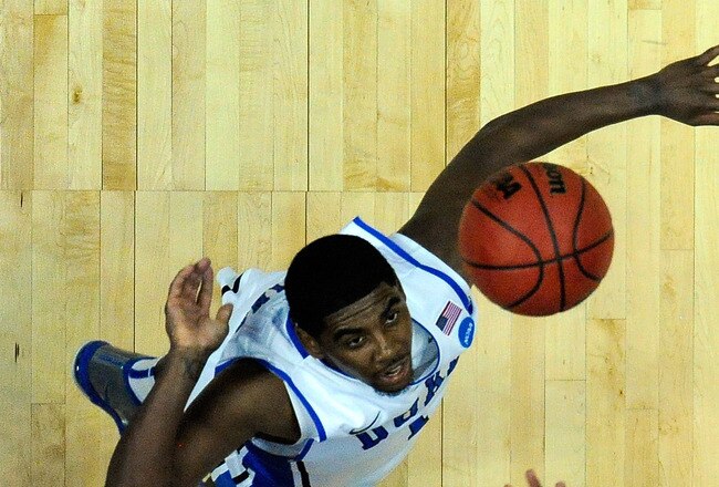 ANAHEIM, CA - MARCH 24:  Derrick Williams #23 of the Arizona Wildcats goes up for the ball against Kyrie Irving #1 of the Duke Blue Devils during the west regional semifinal of the 2011 NCAA men's basketball tournament at the Honda Center on March 24, 2011 in Anaheim, California.  (Photo by Kevork Djansezian/Getty Images)