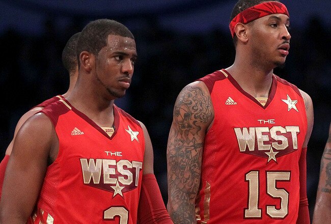 LOS ANGELES, CA - FEBRUARY 20:  Chris Paul #3 of the New Orleans Hornets and the Western Conference, Carmelo Anthony #15 of the Denver Nuggets and the Western Conference and Kobe Bryant #24 of the Los Angeles Lakers and the Western Conference on the floor in the 2011 NBA All-Star Game at Staples Center on February 20, 2011 in Los Angeles, California. NOTE TO USER: User expressly acknowledges and agrees that, by downloading and or using this photograph, User is consenting to the terms and conditions of the Getty Images License Agreement.  (Photo by Jeff Gross/Getty Images)