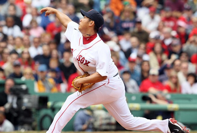 BOSTON, MA - MAY 08: Daisuke Matsuzaka #18 of the Boston Red Sox delivers a pitch in the first inning against the Minnesota Twins on May 8, 2011 at Fenway Park in Boston, Massachusetts.  (Photo by Elsa/Getty Images)