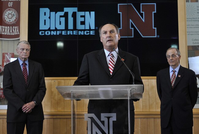 LINCOLN, NE. - JUNE 11:  Big Ten Conference Commissioner James Delany (C) University of Nebraska Athletic Director Tom Osbourne (L) at a press conference announcing Nebraska accepting an invitation to join the Big Ten Conference June 11, 2010  in Lincoln, Nebraska.  The university will begin integration immediately and start athletic competition as soon as 2011. (Photo by Eric Francis/Getty Images)